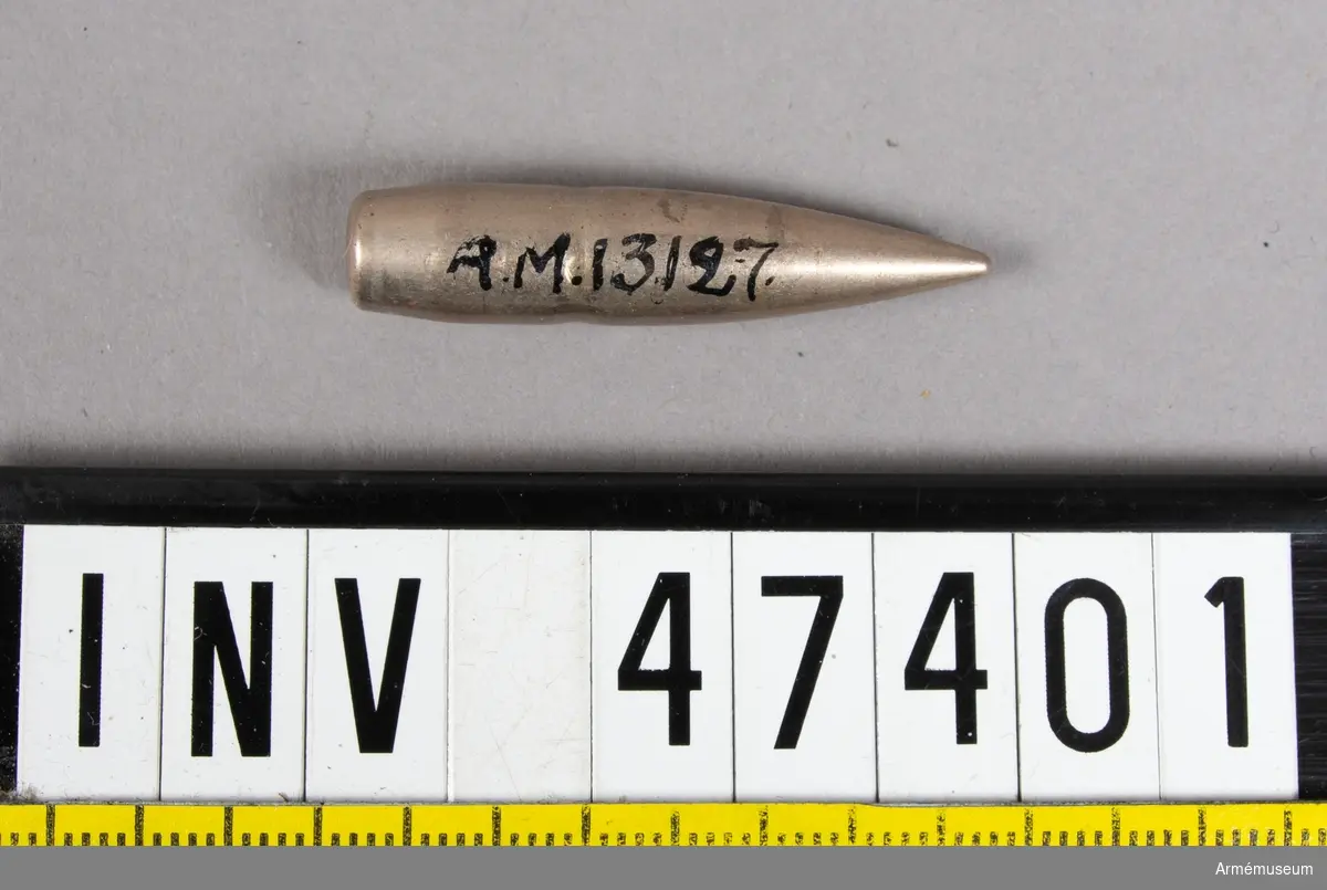 Grupp E V.
8 mm torpedkula av nyckelmantlat bly, troligen fransk.