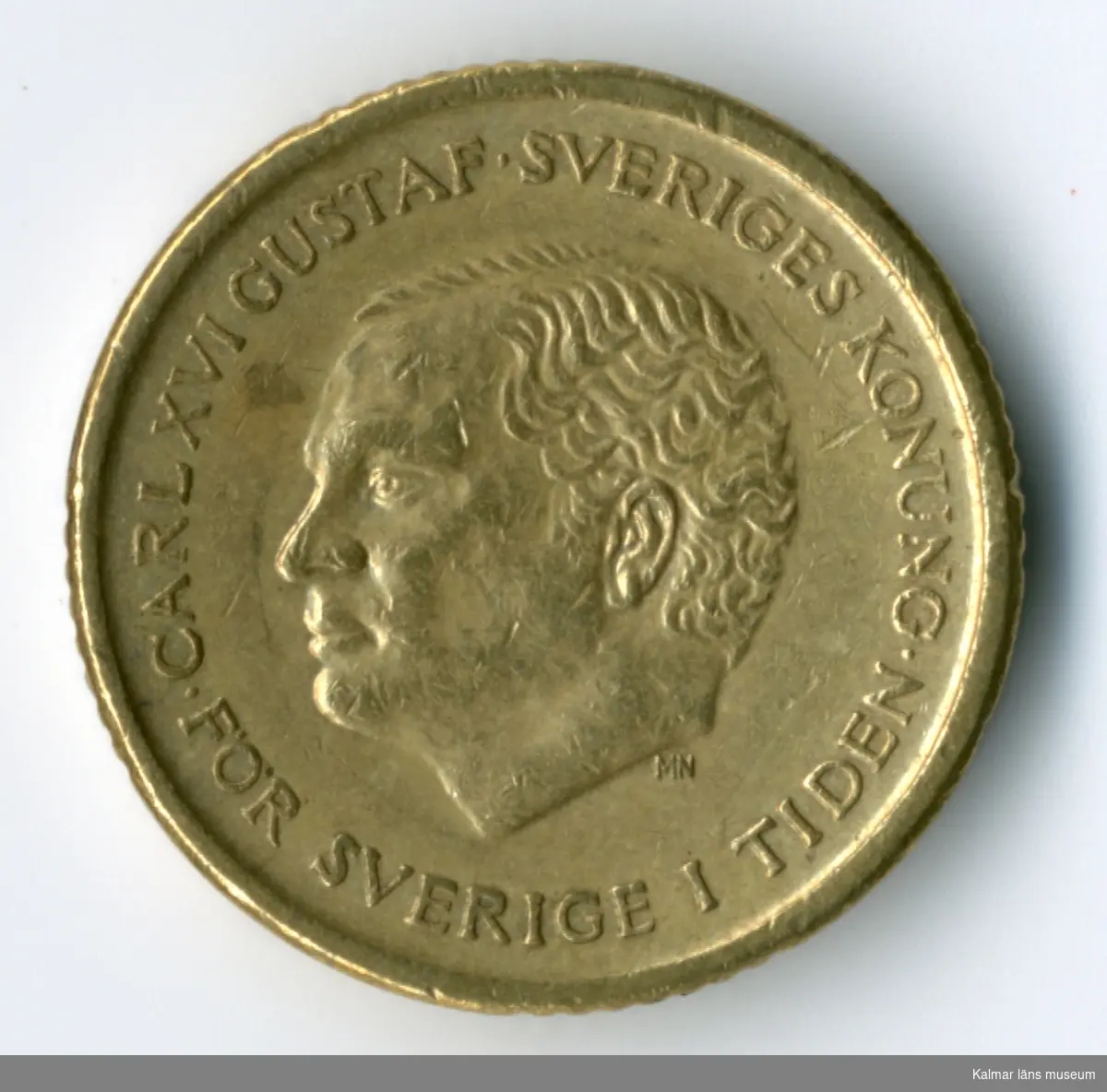 KLM 46167:83 Mynt, av metall, 10 kronor. Utgiven 1991. Under Carl XVI Gustafs tid.