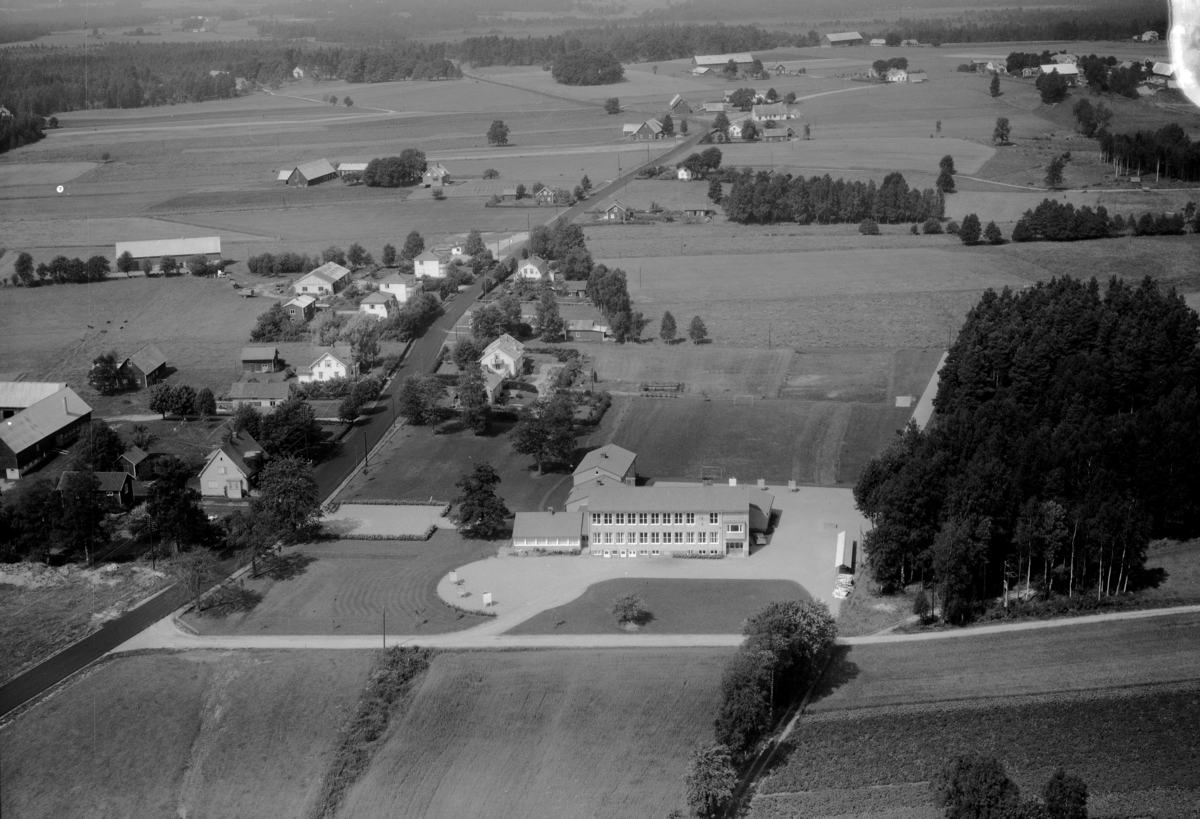 Flygfoto över Ås i Gislaveds kommun, Jönköpings län. 1133/1963