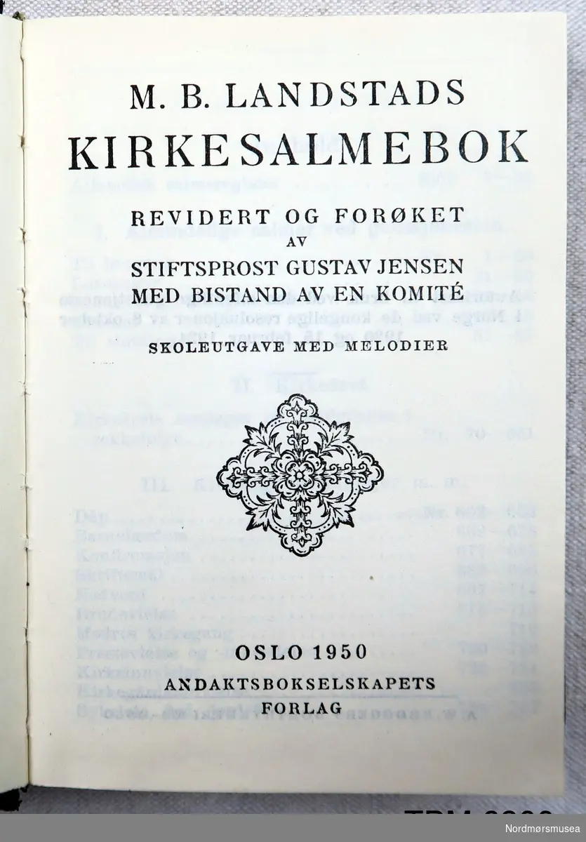 Salmebok av vanleg type. Svart bind og gullskrift på ryggen. 860 sider.