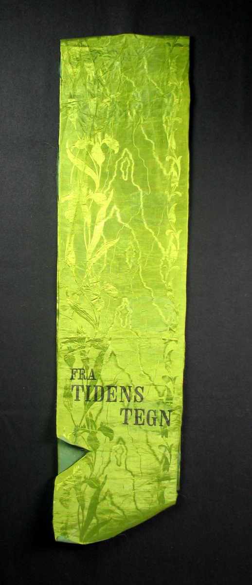 Begravelsessløyfe i lys grønn silke.