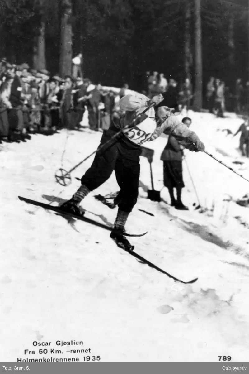 Skiløper, publikum langs løypa, Holmenkollrennene, vinter