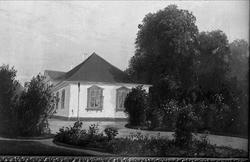 Avfotografering.Avfotografering av et maleri av et hus. Frø