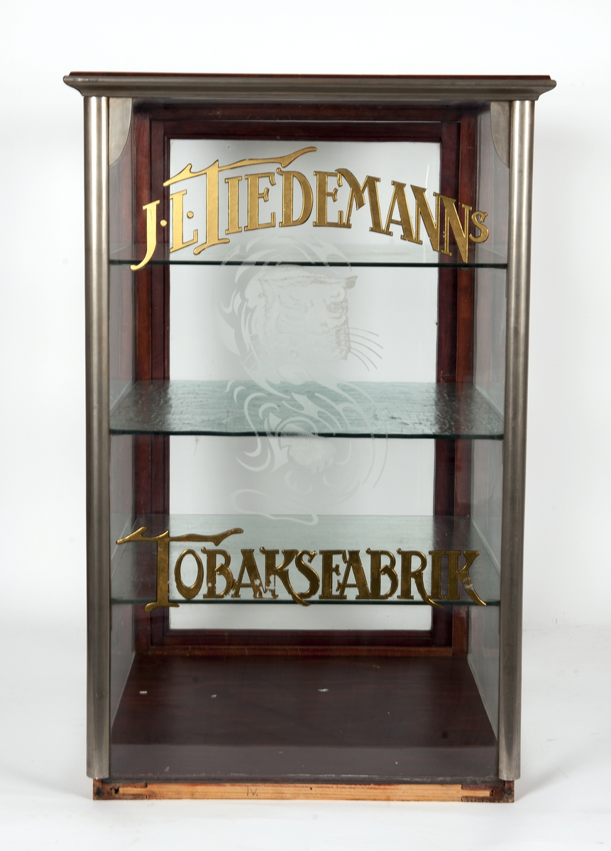 Glass-skap for tobakk med motiv av Tiedemanns tigermerke.