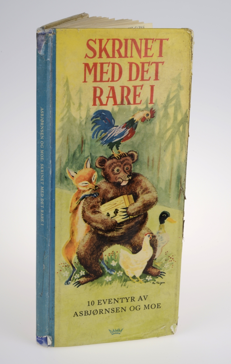 Rektangulær bok med stive permer. Boken er illustrert av Per Teigen.